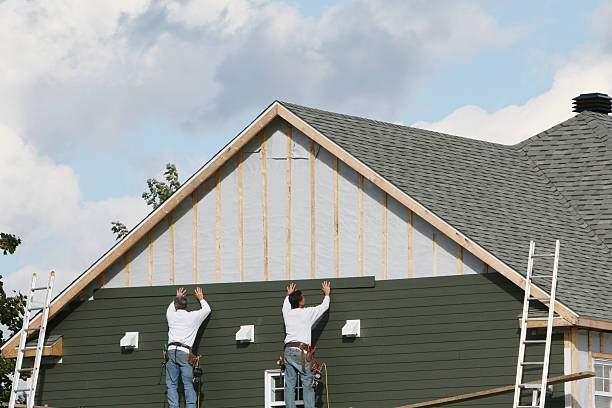 Professional Siding technician working in Fairburn, GA